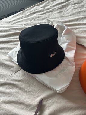 Hermes Black Bucket Hat with Silver Eyelet Details